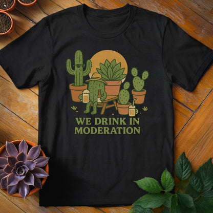 We Drink in Moderation Tee T-Shirt Black / S